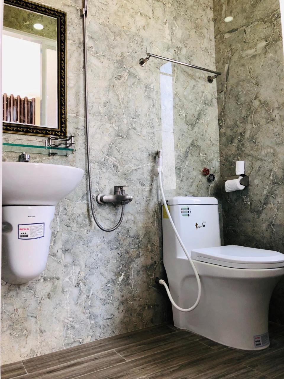 Ngoc Huong Hostel & Apartments Куинён Экстерьер фото